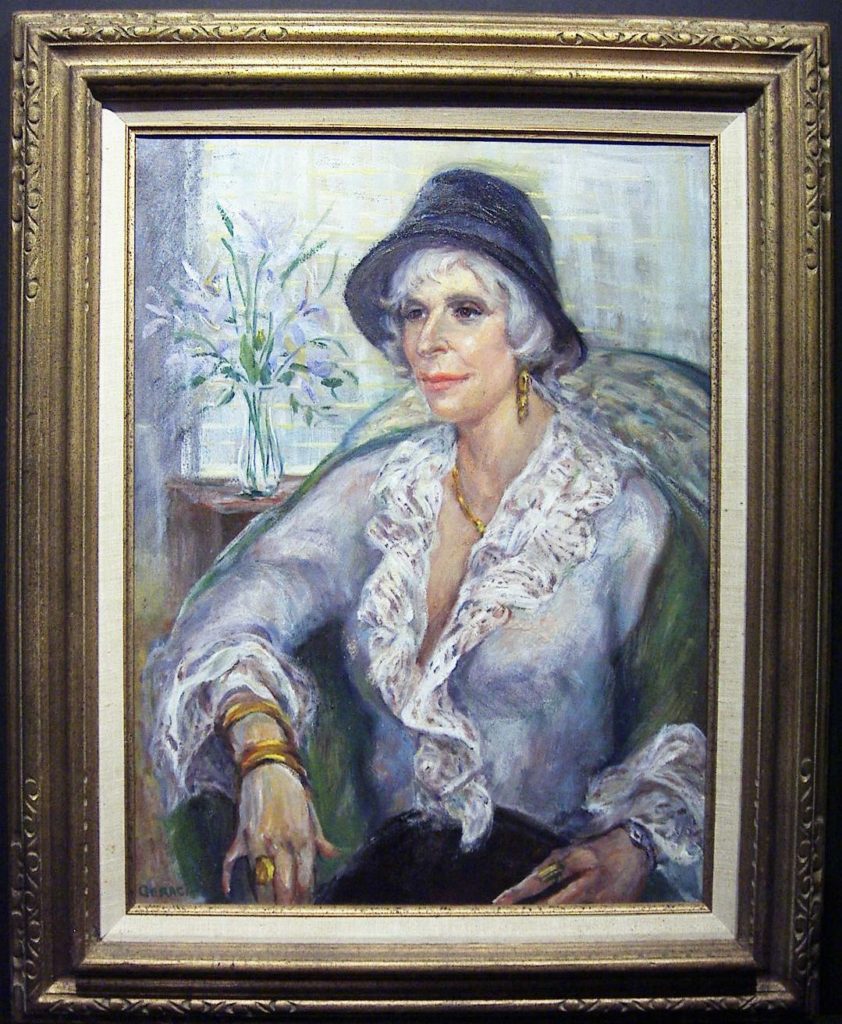 Framed oil painting of a lady.